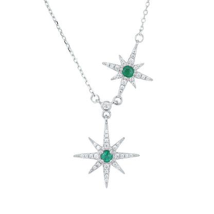 Silver necklace with star-shaped pendants featuring green emerald gemstones on a white background
