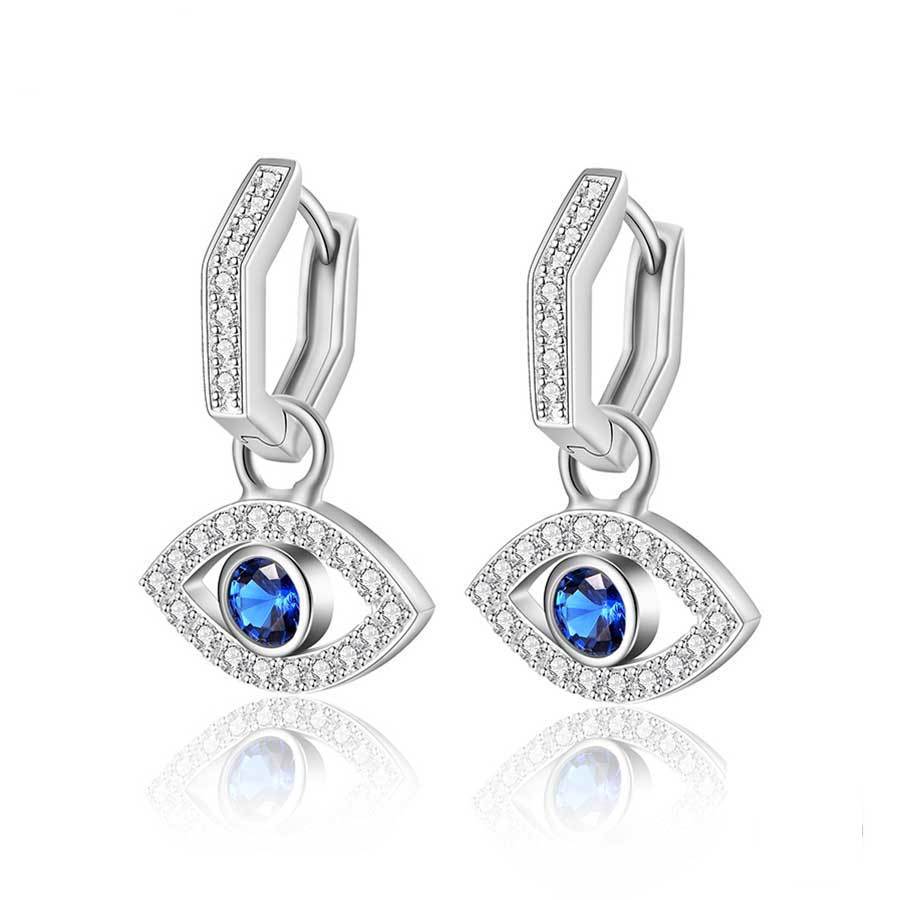 Silver evil eye drop earrings with blue and white gemstones on a white background