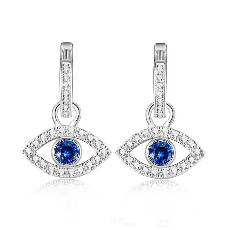 Pair of silver eye-shaped earrings with blue and white gemstones on a white background