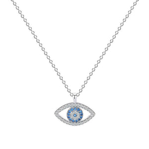 Silver necklace with an eye-shaped pendant featuring blue stones on a white background