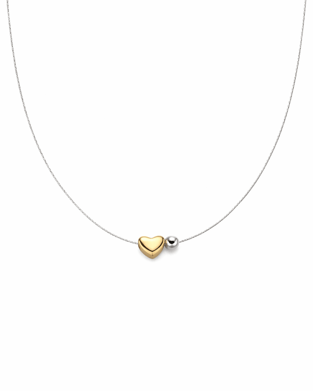 Necklace with a gold heart-shaped pendant on a white background