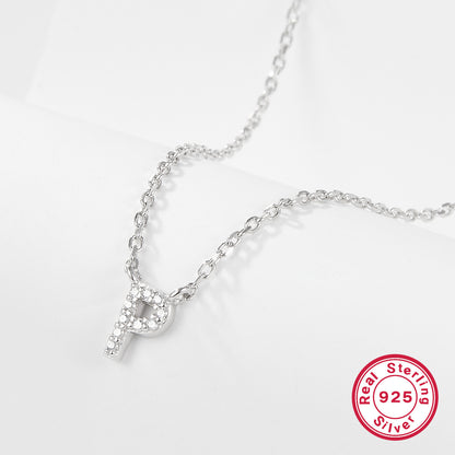Silver necklace with a letter 'P' pendant on a white background, featuring a 'Real Sterling Silver 925' stamp.