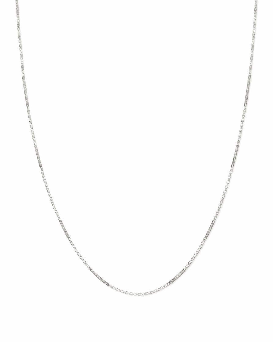 Silver clavicle chain necklace on a white background