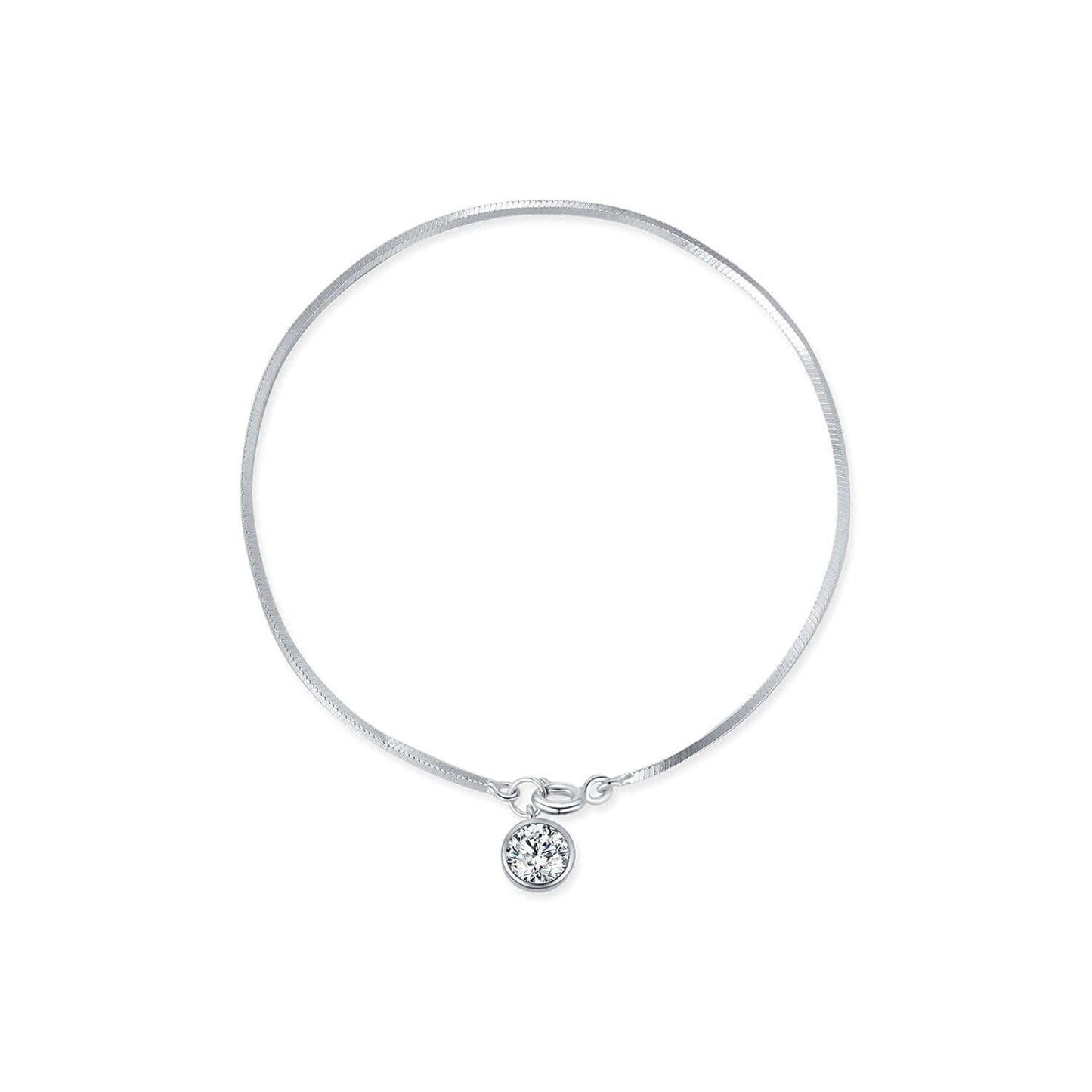 Silver bracelet with a small round pendant and snake chain on a white background