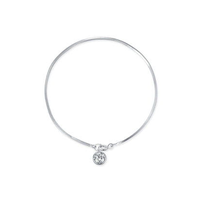 Silver bracelet with a small round pendant and snake chain on a white background