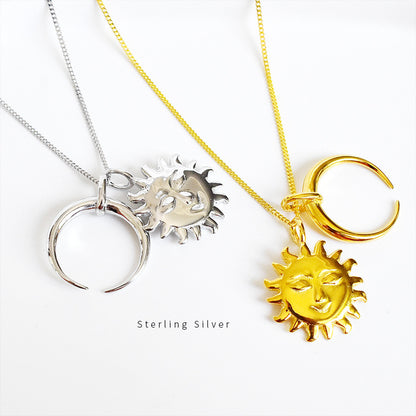 Two necklaces with sun and moon-shaped pendants, one in sterling silver and the other in gold color, on a white background.