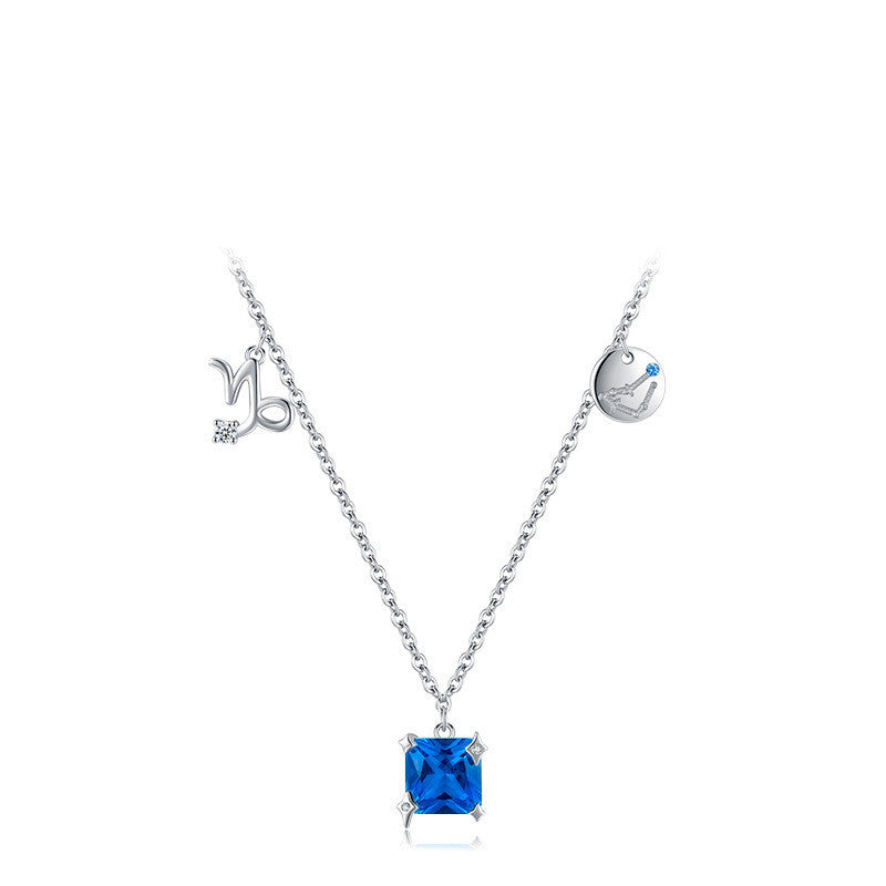 Necklace with a square blue gemstone pendant on a white background