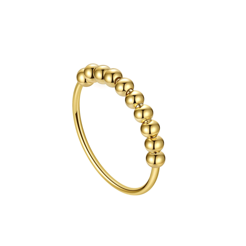 Close-up of elegant gold-plated 925 sterling silver beaded fidget ring, featuring seven movable spheres for anxiety relief