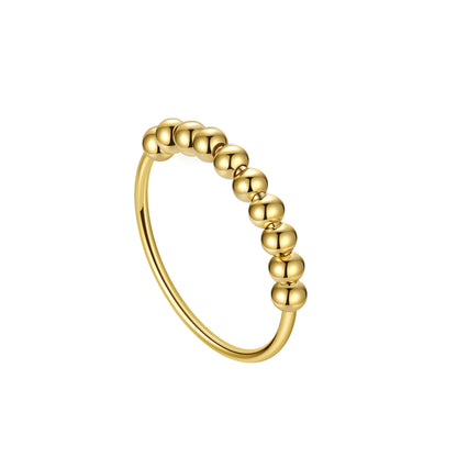 Close-up of elegant gold-plated 925 sterling silver beaded fidget ring, featuring seven movable spheres for anxiety relief