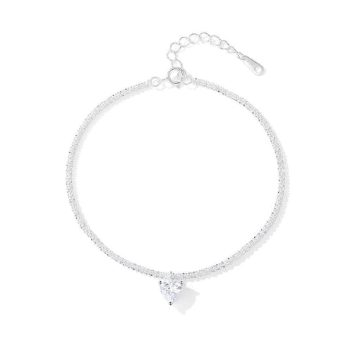 Silver bracelet with a heart-shaped charm on a white background.