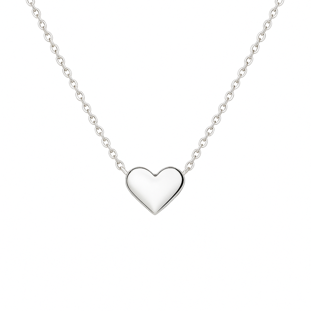 Silver heart-shaped pendant on a chain against a white background