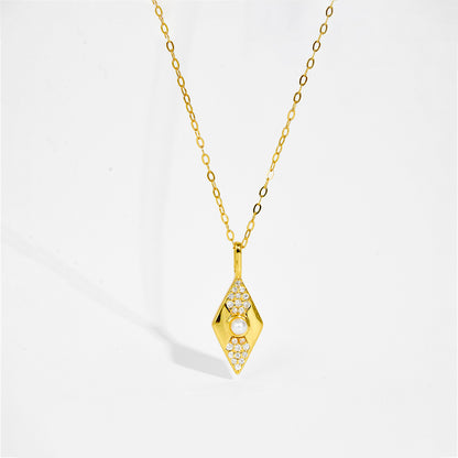 Gold color necklace with a diamond-shaped pendant on a white background