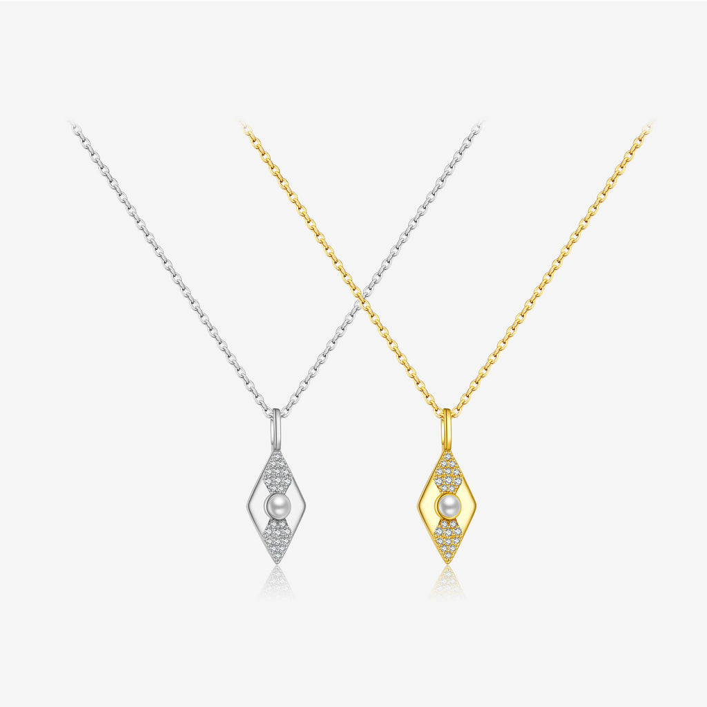 Two diamond-shaped necklaces, one gold and one silver, on a white background.